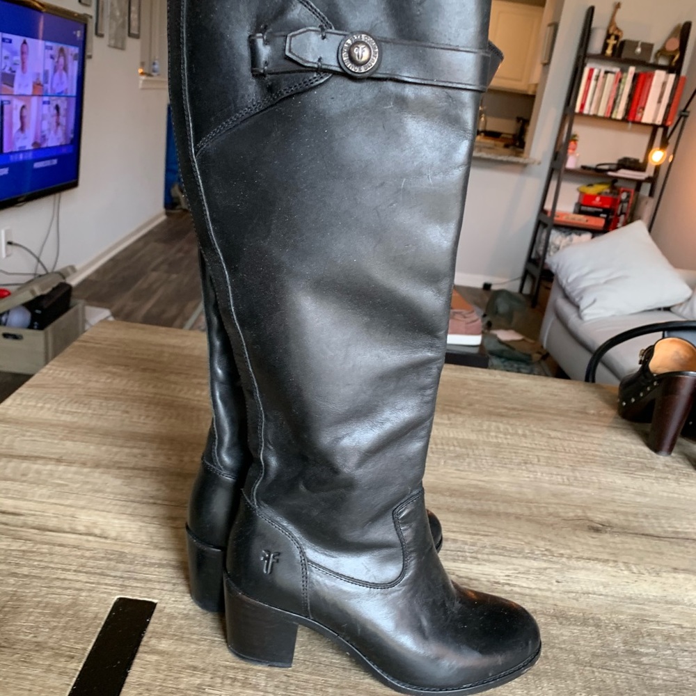 Tall black Frye Molly boots with mid size heel